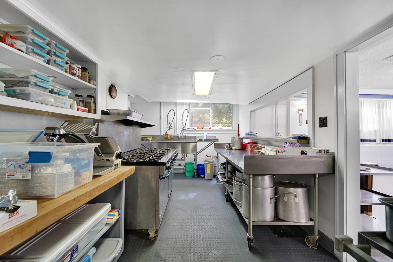 512 Temple Street Whiting, IN 46394 - Photo 11 of 22 a living room with lots of furniture and clutter