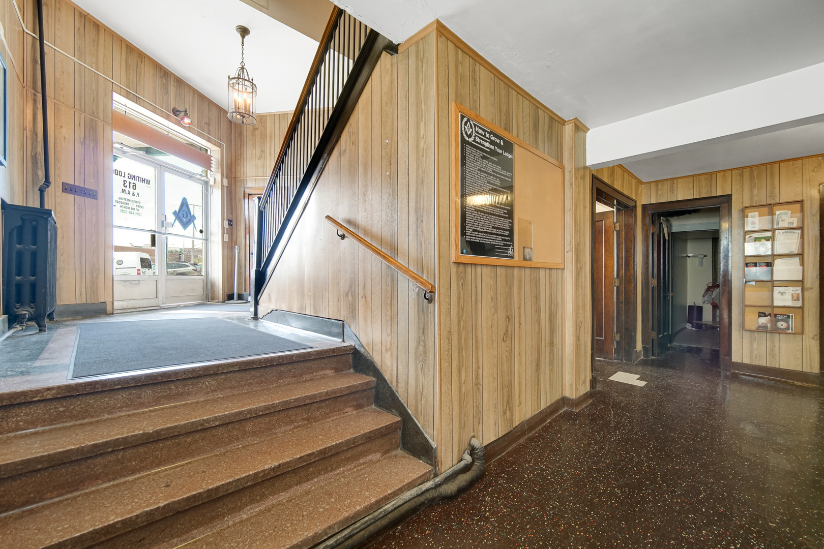 512 Temple Street Whiting, IN 46394 - Photo 14 of 22 a view of entryway and hall with wooden floor