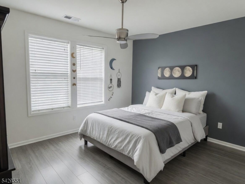 5 West River Styx Road, Unit 301 Hopatcong, NJ 07843 - Photo 5 of 8 a bedroom with a bed and a window