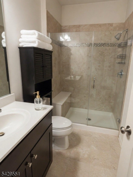 5 West River Styx Road, Unit 301 Hopatcong, NJ 07843 - Photo 8 of 8 a bathroom with a sink a toilet and shower