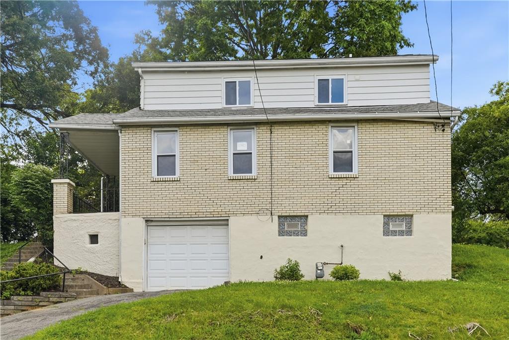 480 Songo Street Pittsburgh, PA 15227 - Photo 3 of 36 front view of a house with a yard