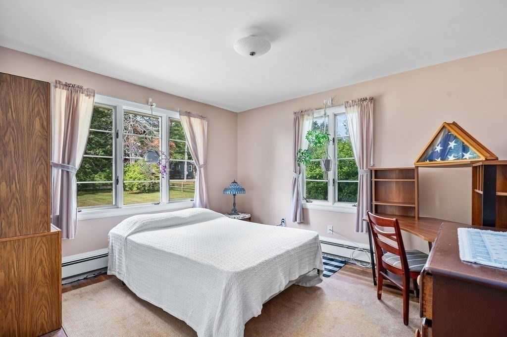 12 Kimball Road Amesbury, MA 01913 - Photo 20 of 36 a bedroom with a bed and a large window