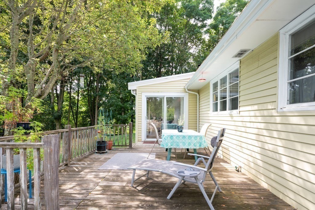 12 Kimball Road Amesbury, MA 01913 - Photo 23 of 36 a view of a house with backyard and sitting area