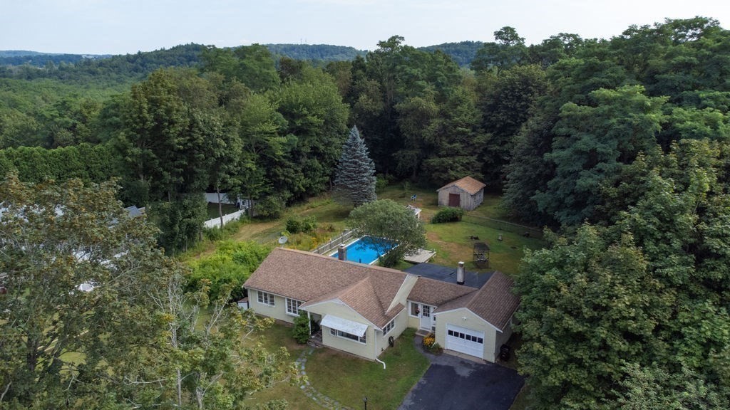 12 Kimball Road Amesbury, MA 01913 - Photo 30 of 36 an aerial view of a house with pool outdoor seating yard and mountain view