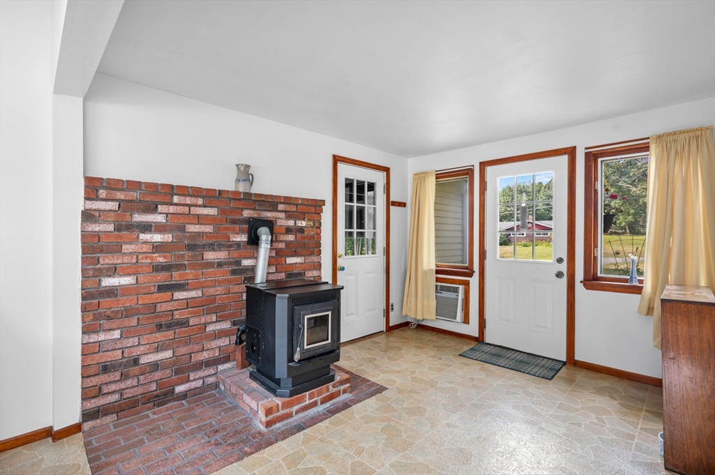 12 Kimball Road Amesbury, MA 01913 - Photo 9 of 36 a view of an empty room with furniture and a window