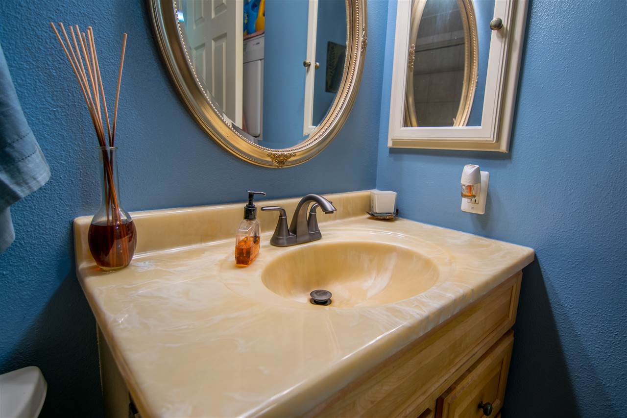 1450 South Kihei Road, Unit A205 Kihei, HI 96753 - Photo 19 of 24 a bathroom with a sink and a mirror