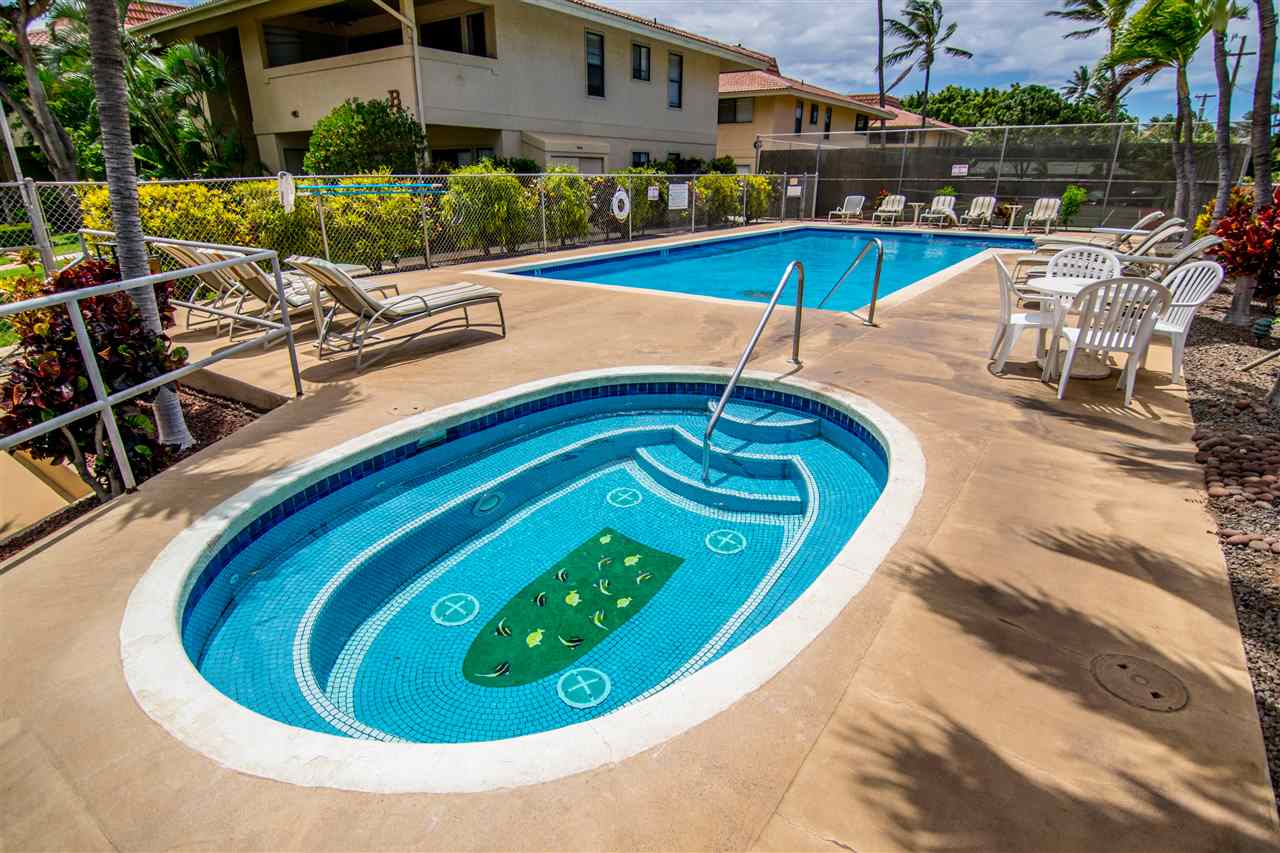 1450 South Kihei Road, Unit A205 Kihei, HI 96753 - Photo 22 of 24 a swimming pool with outdoor seating yard and outdoor seating