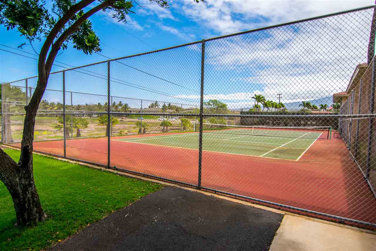 1450 South Kihei Road, Unit A205 Kihei, HI 96753 - Photo 24 of 24 a view of a tennis court with a big yard
