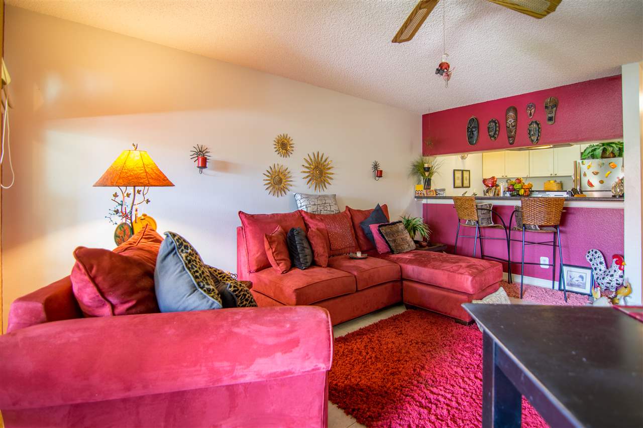 1450 South Kihei Road, Unit A205 Kihei, HI 96753 - Photo 7 of 24 a living room with furniture and a couch