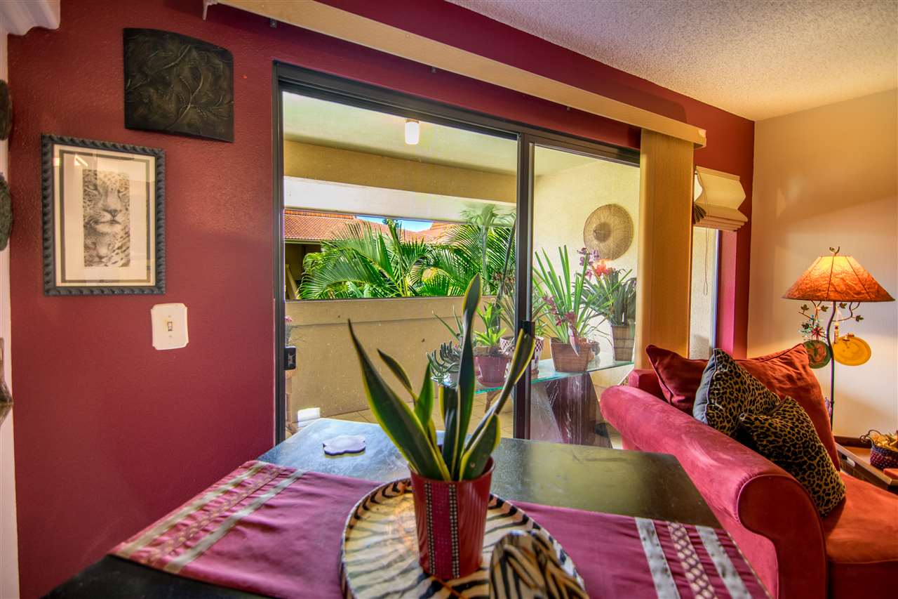 1450 South Kihei Road, Unit A205 Kihei, HI 96753 - Photo 9 of 24 a vase of flowers sitting on a table