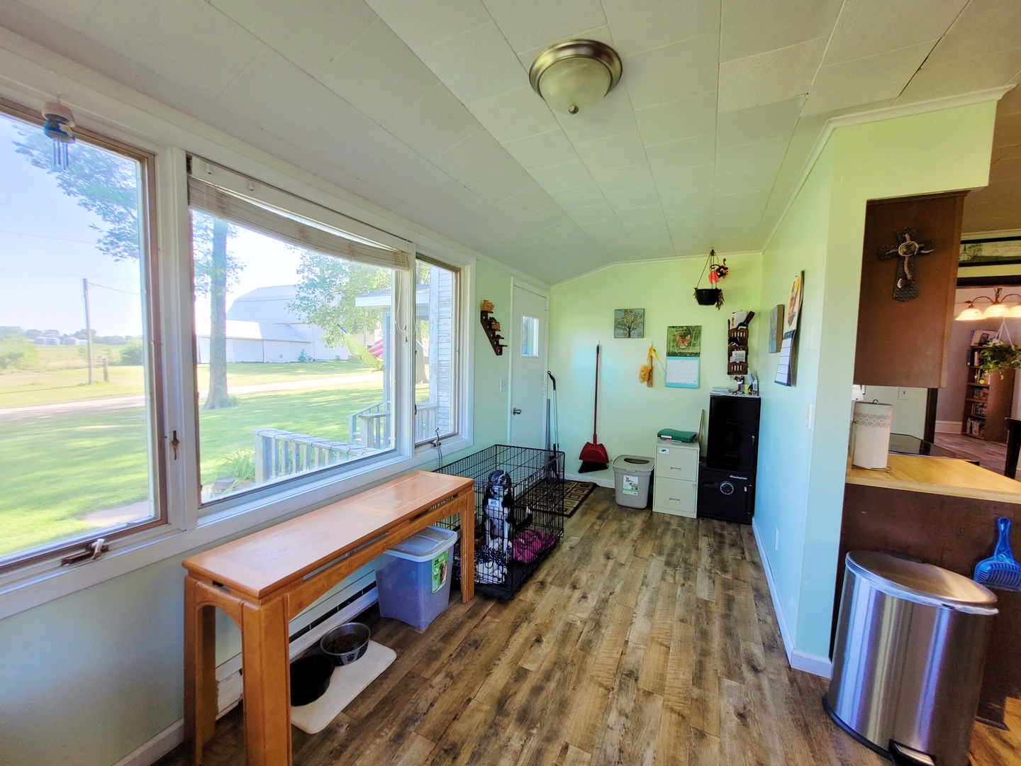 12120 Mason Road Morrison, IL 61270 - Photo 8 of 33 a room with furniture and wooden floor