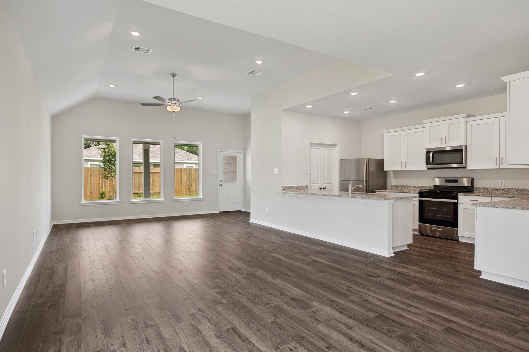 344 Fastboy Lane Waller, TX 77484 - Photo 3 of 9 a view of kitchen with granite countertop stainless steel appliances refrigerator sink and cabinets