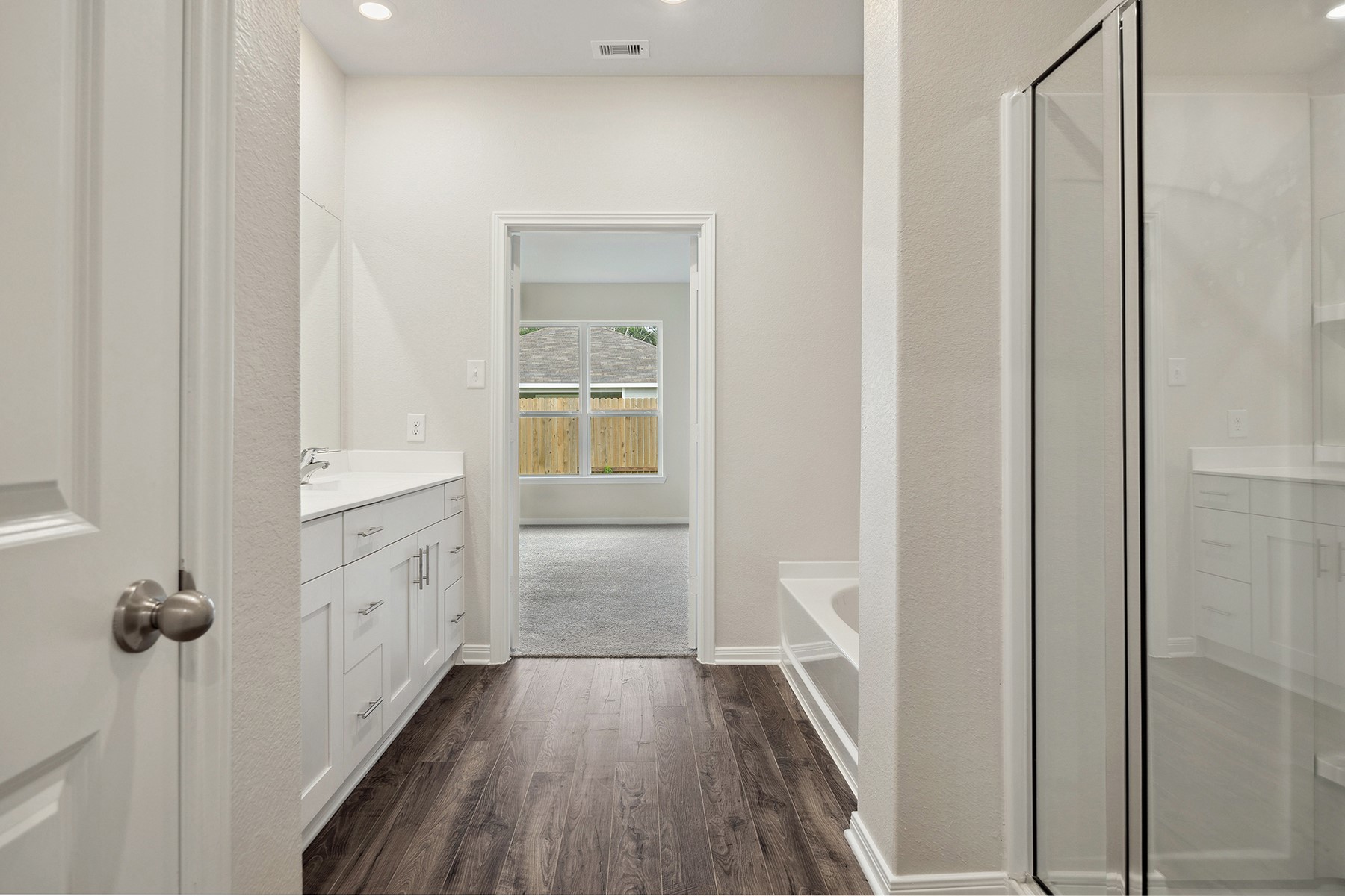 344 Fastboy Lane Waller, TX 77484 - Photo 7 of 9 a bathroom with a sink and a mirror