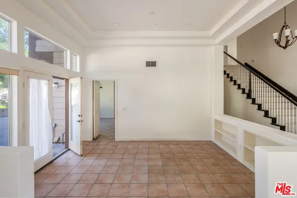 a view of an entryway with stairs