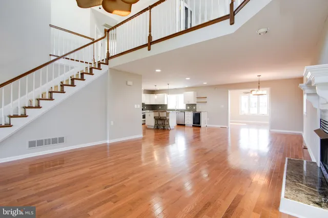 a bathroom with 2 sink and a mirror