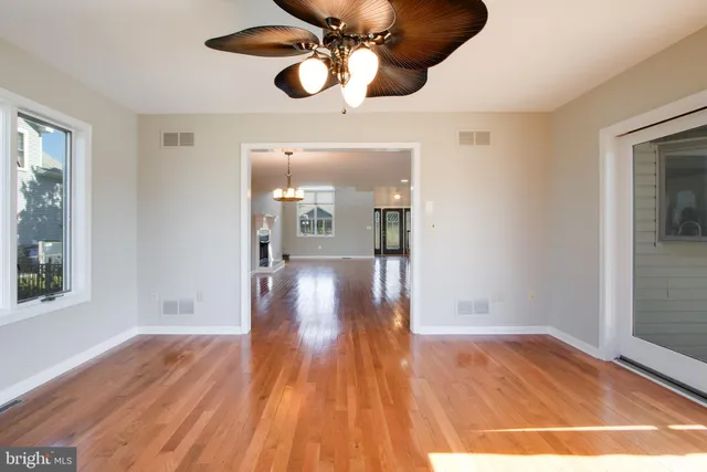 a view of a room with wooden walls