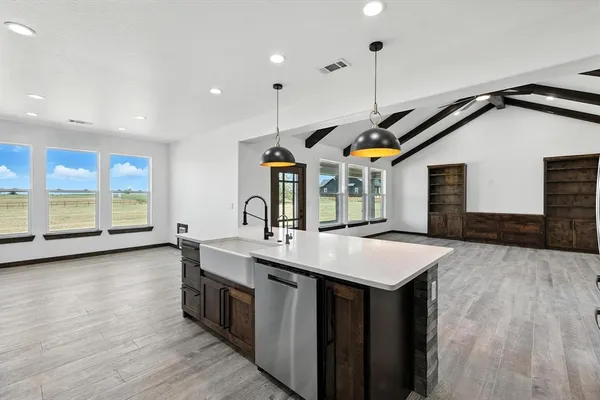 a kitchen with counter top space and a sink