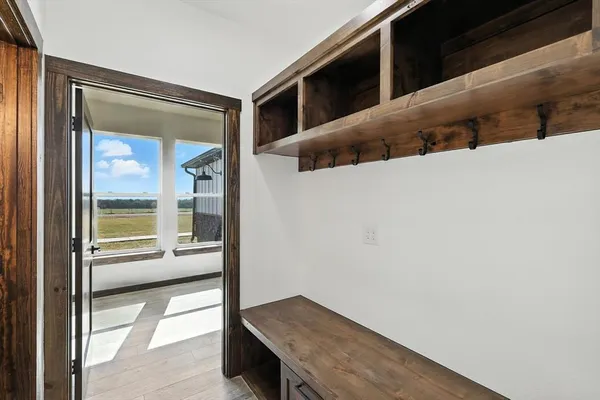 a view of balcony and a hallway