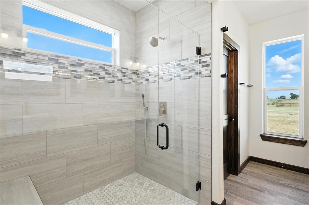 835 Clb Lk Road Whitesboro, TX 76273 - Photo 20 of 33 a bathroom with a shower