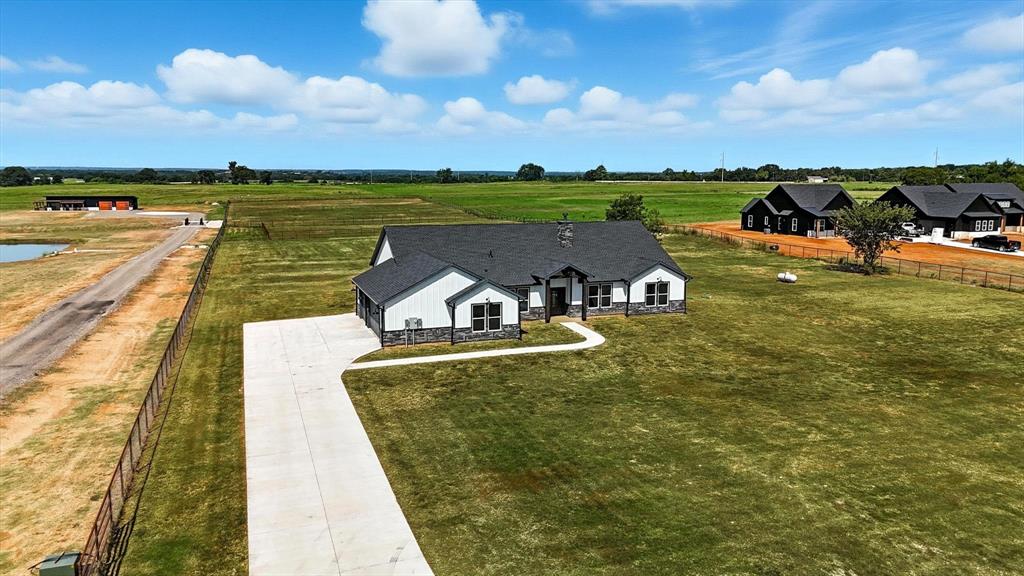 835 Clb Lk Road Whitesboro, TX 76273 - Photo 32 of 33 swimming pool view with a lake view
