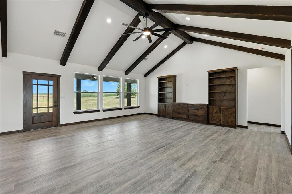 835 Clb Lk Road Whitesboro, TX 76273 - Photo 6 of 33 a view of empty room with wooden floor