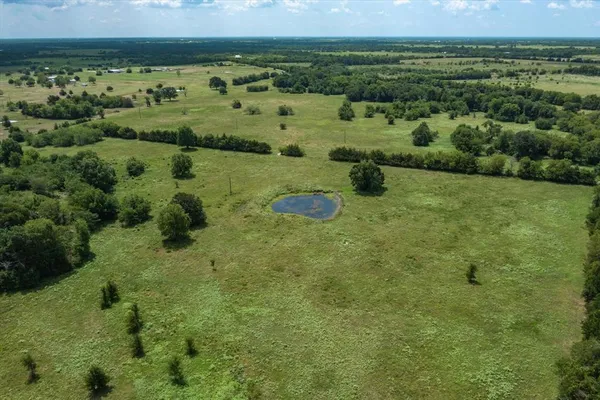 a view of a lush green field