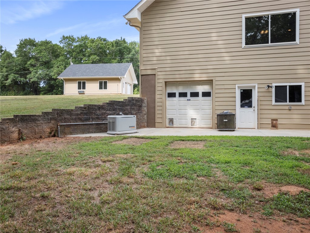 130 Thompson Road Pendleton, SC 29670 - Photo 30 of 34 Workshop with Roll Up Door