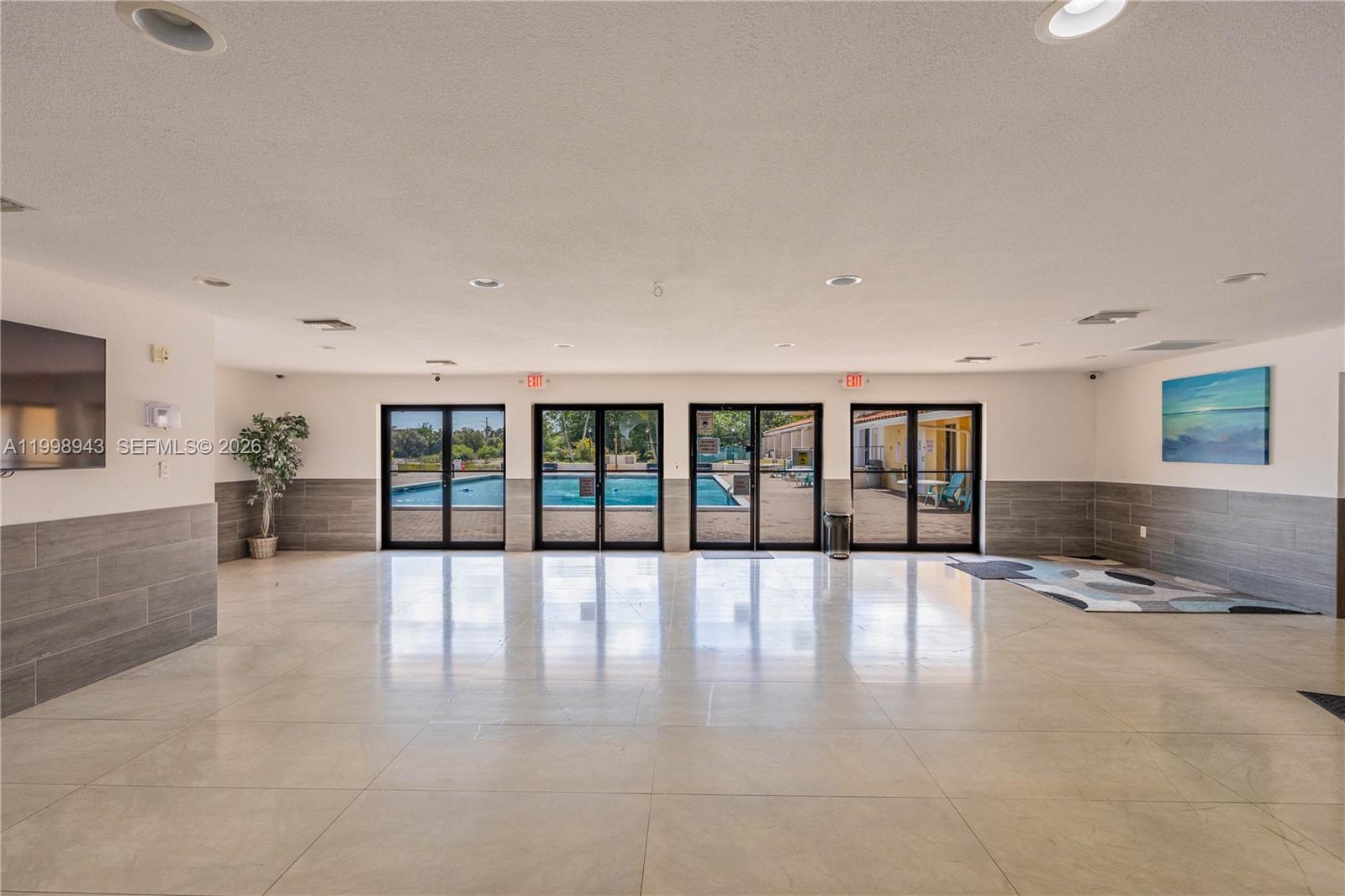 4164 Inverrary Drive, Unit 812 Lauderhill, FL 33319 - Photo 19 of 21 a view of an empty room with a window