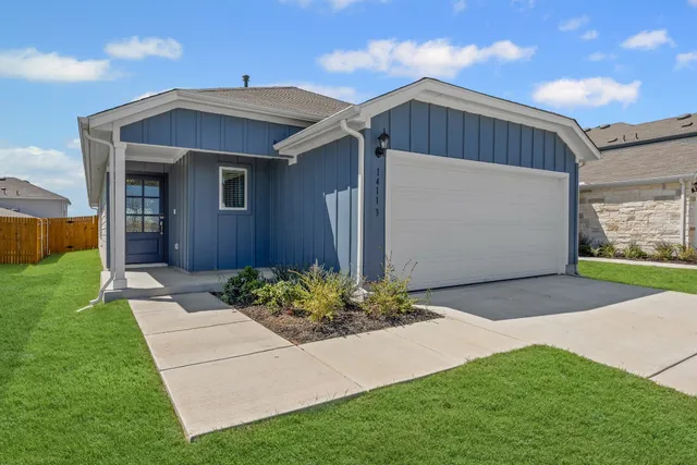 a front view of house with yard
