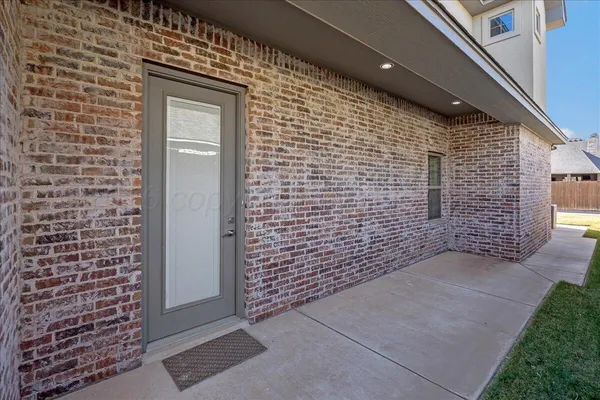 a front view of a house with a garage