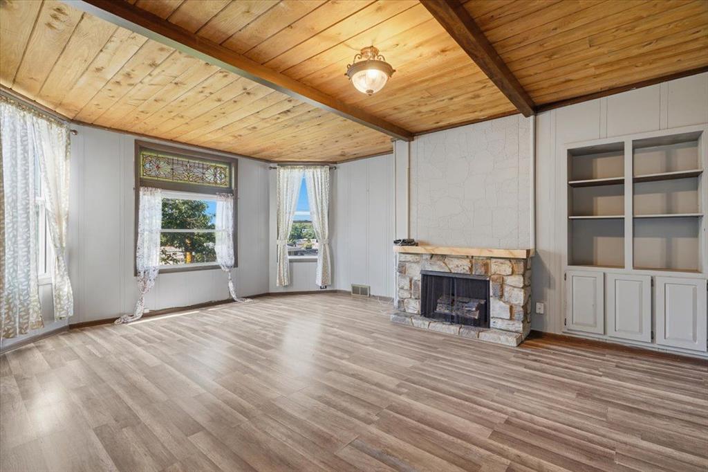15 Division Street Pittsburgh, PA 15205 - Photo 19 of 44 a view of an empty room with a window and fire place