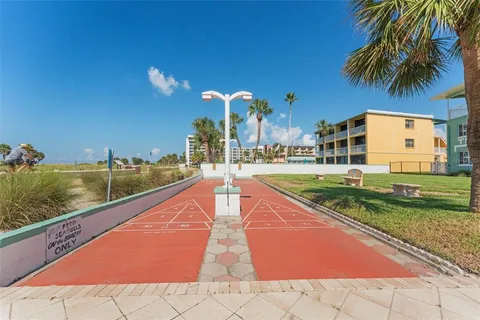 a view of swimming pool with a yard