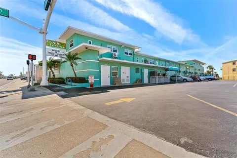 a view of a building with a street