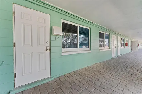 a view of empty room with windows