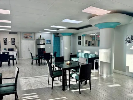 a view of a dining room with furniture