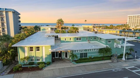 a aerial view of a house with a garden and plants