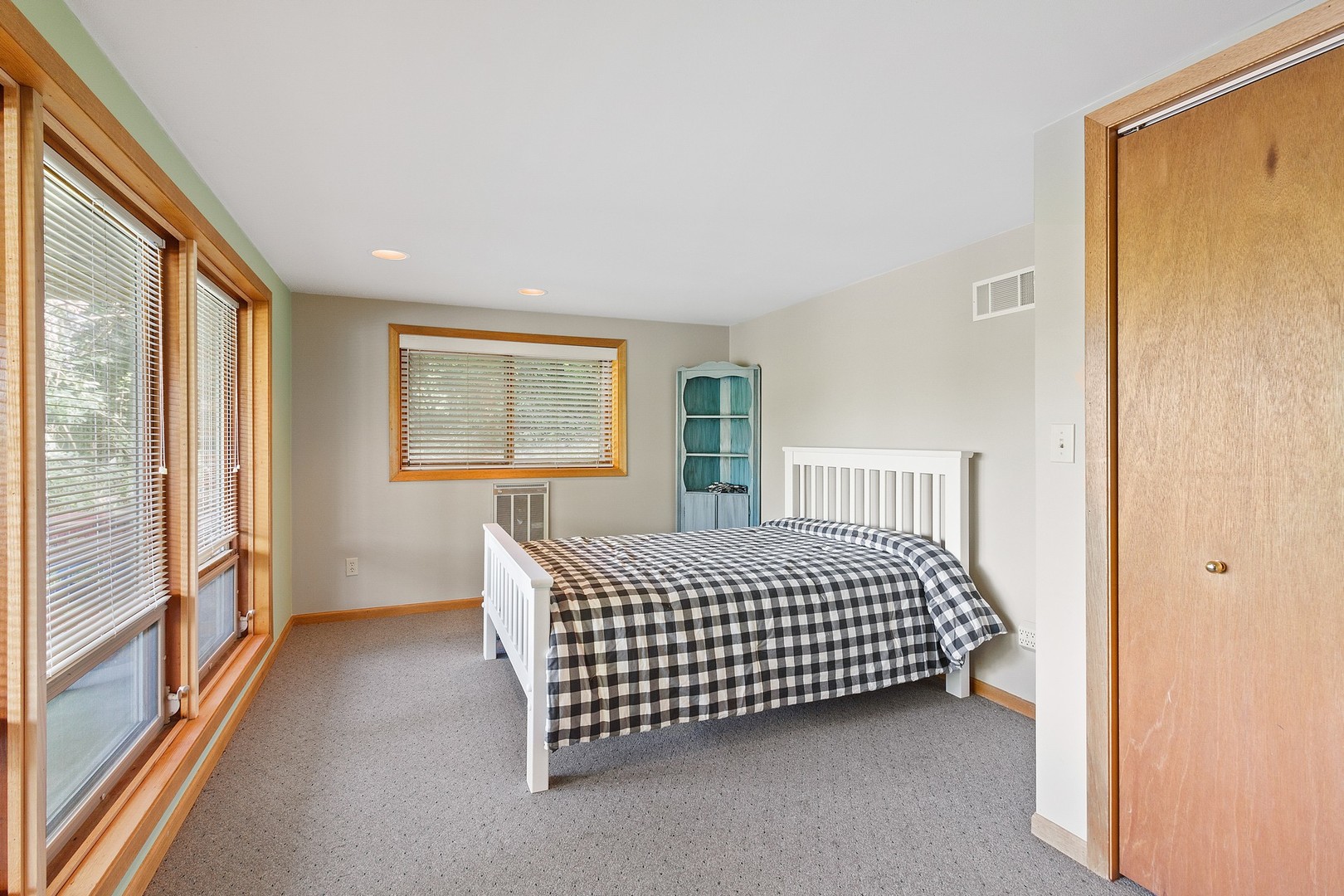 3390 North Jugtown Road Morris, IL 60450 - Photo 21 of 34 a bed sitting in a bedroom next to a window