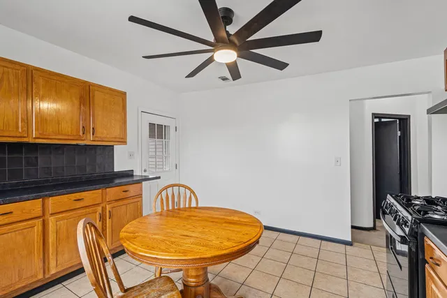 a view of a kitchen area with furniture