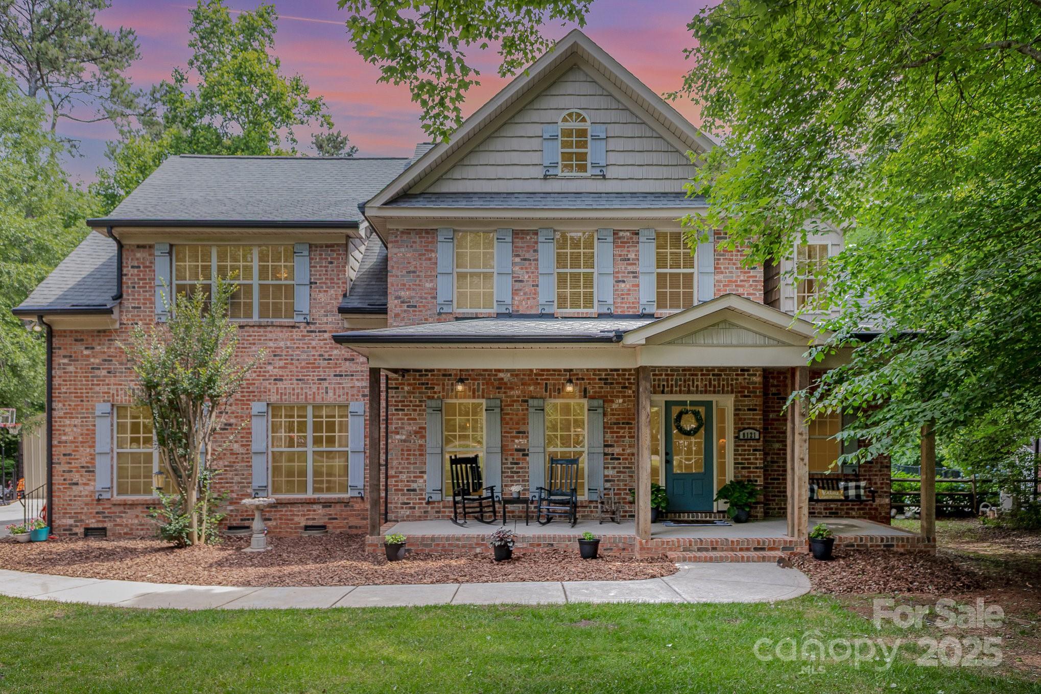 a front view of house with yard outdoor seating and yard