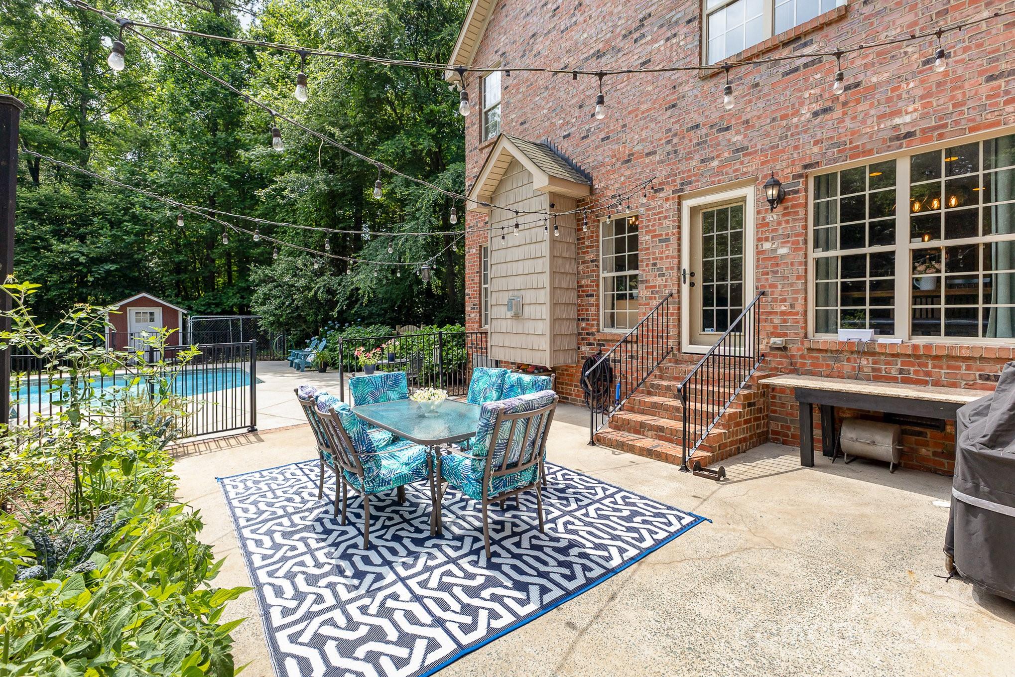 8121 Cane Pointe Lane Waxhaw, NC 28173 - Photo 30 of 39 a view of a chairs and table in the patio