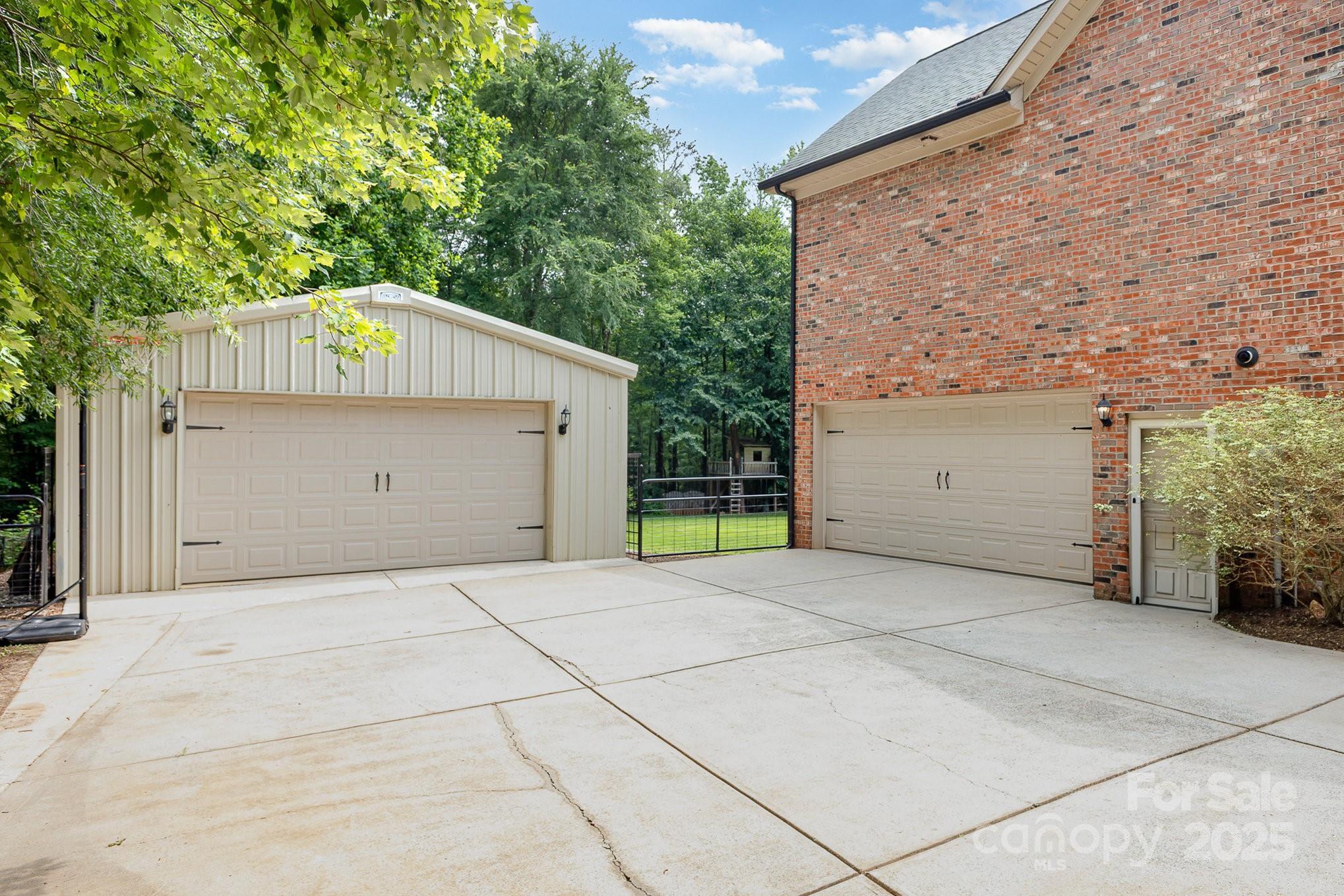 8121 Cane Pointe Lane Waxhaw, NC 28173 - Photo 35 of 39 a front view of a house with a yard and garage