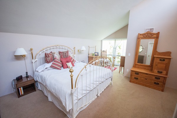 27 Draper Road Wayland, MA 01778 - Photo 12 of 21 a bed room with a bed and a chair