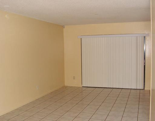 5296 Gate Lake Road, Unit 5296 Tamarac, FL 33319 - Photo 7 of 16 a view of an empty room