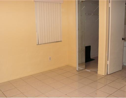 5296 Gate Lake Road, Unit 5296 Tamarac, FL 33319 - Photo 9 of 16 a view of an empty room