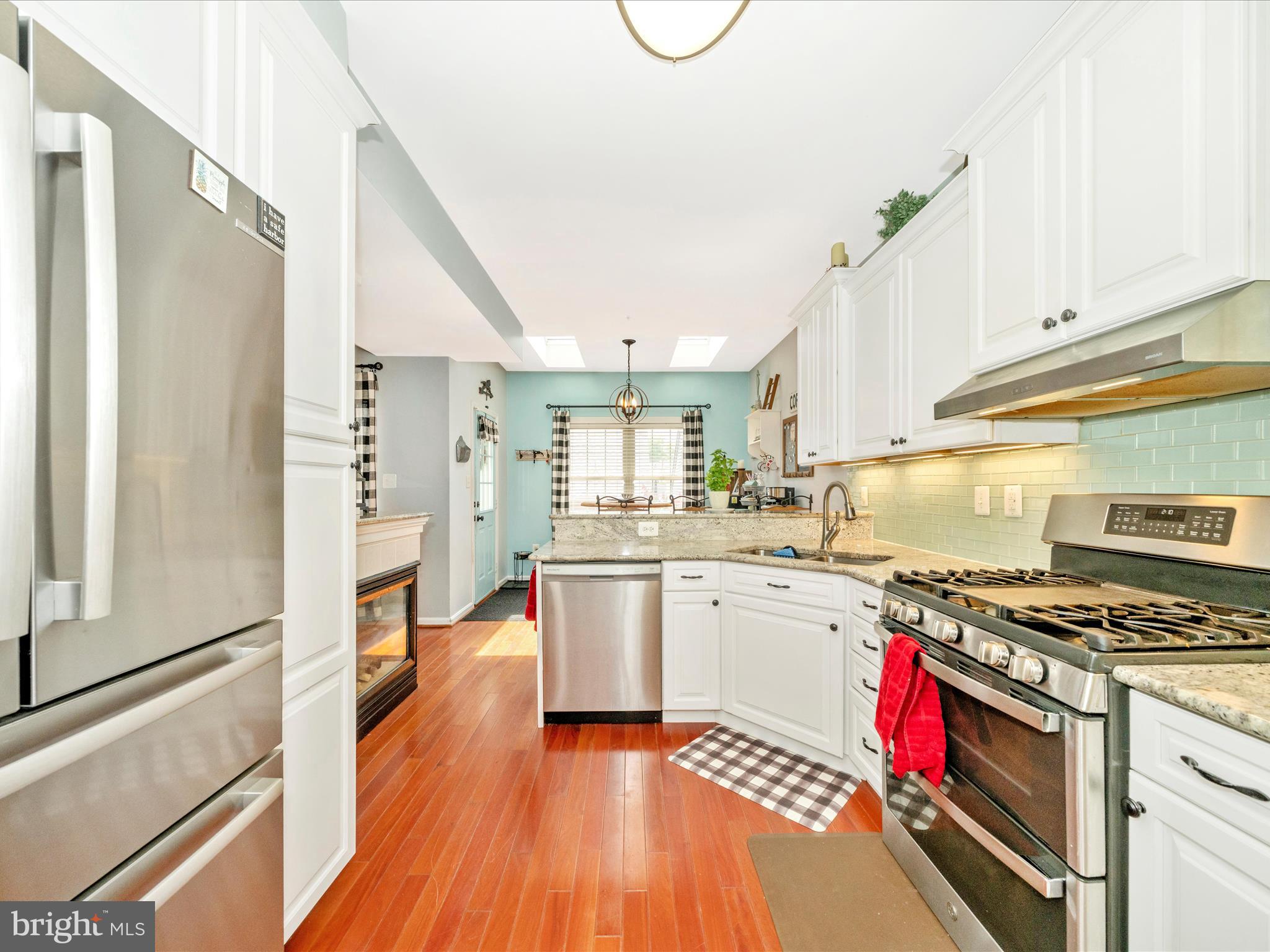 2529 Waterside Drive Frederick, MD 21701 - Photo 17 of 68 a kitchen with a stove a sink and a refrigerator