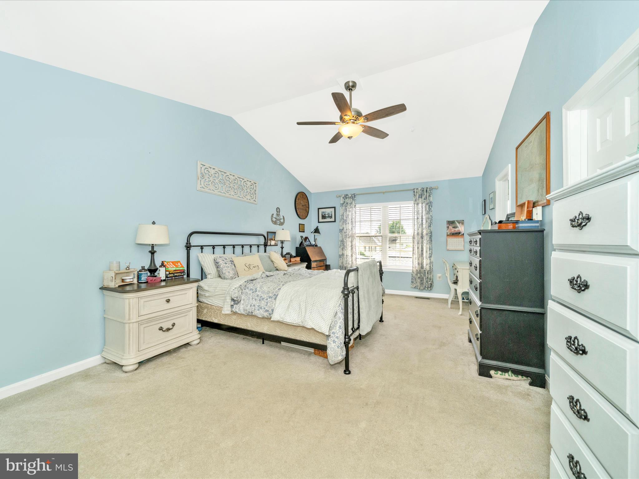 2529 Waterside Drive Frederick, MD 21701 - Photo 23 of 68 a bed room with a bed and a chandelier