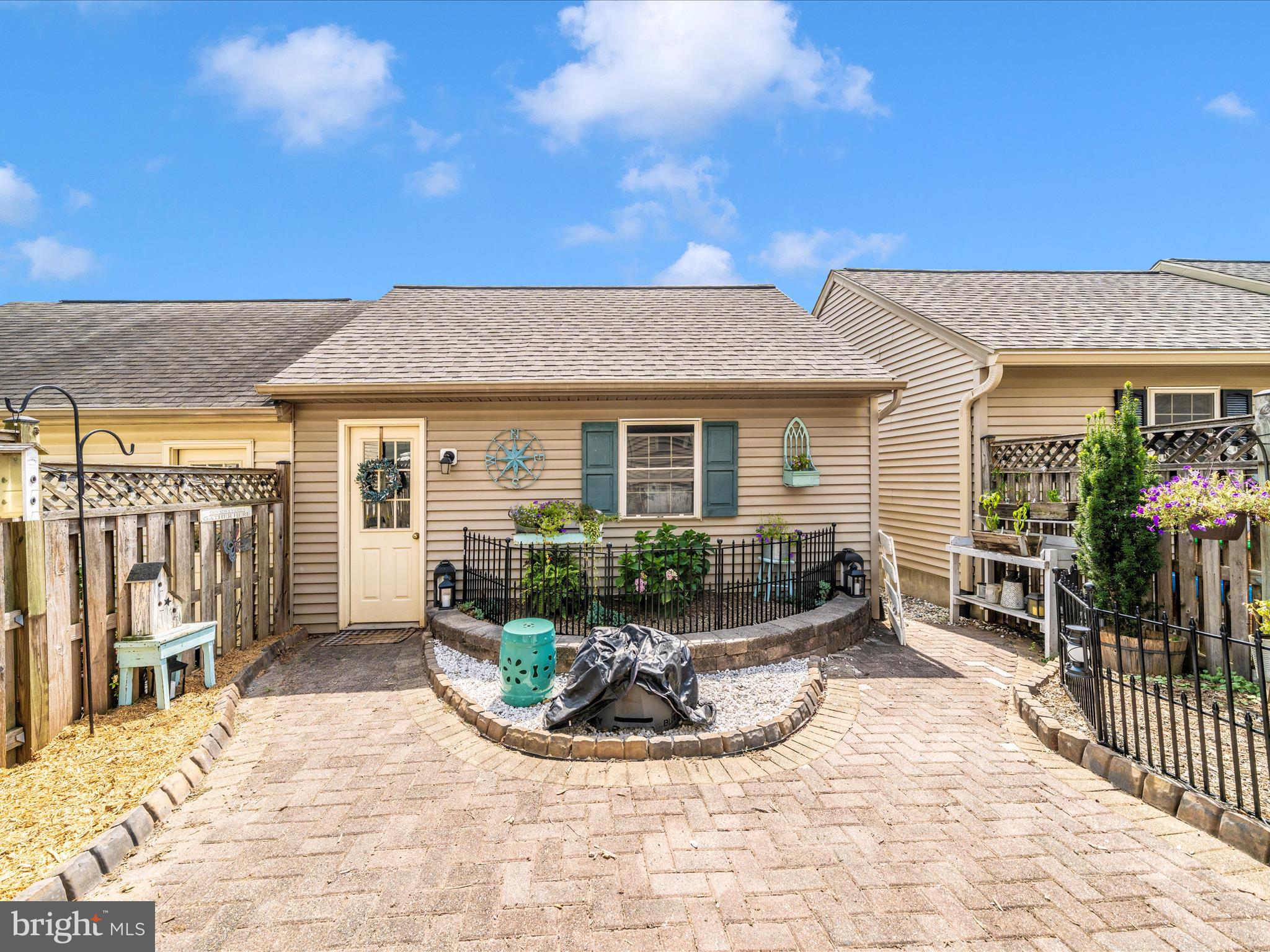 2529 Waterside Drive Frederick, MD 21701 - Photo 39 of 68 a view of a house with sitting area and garden