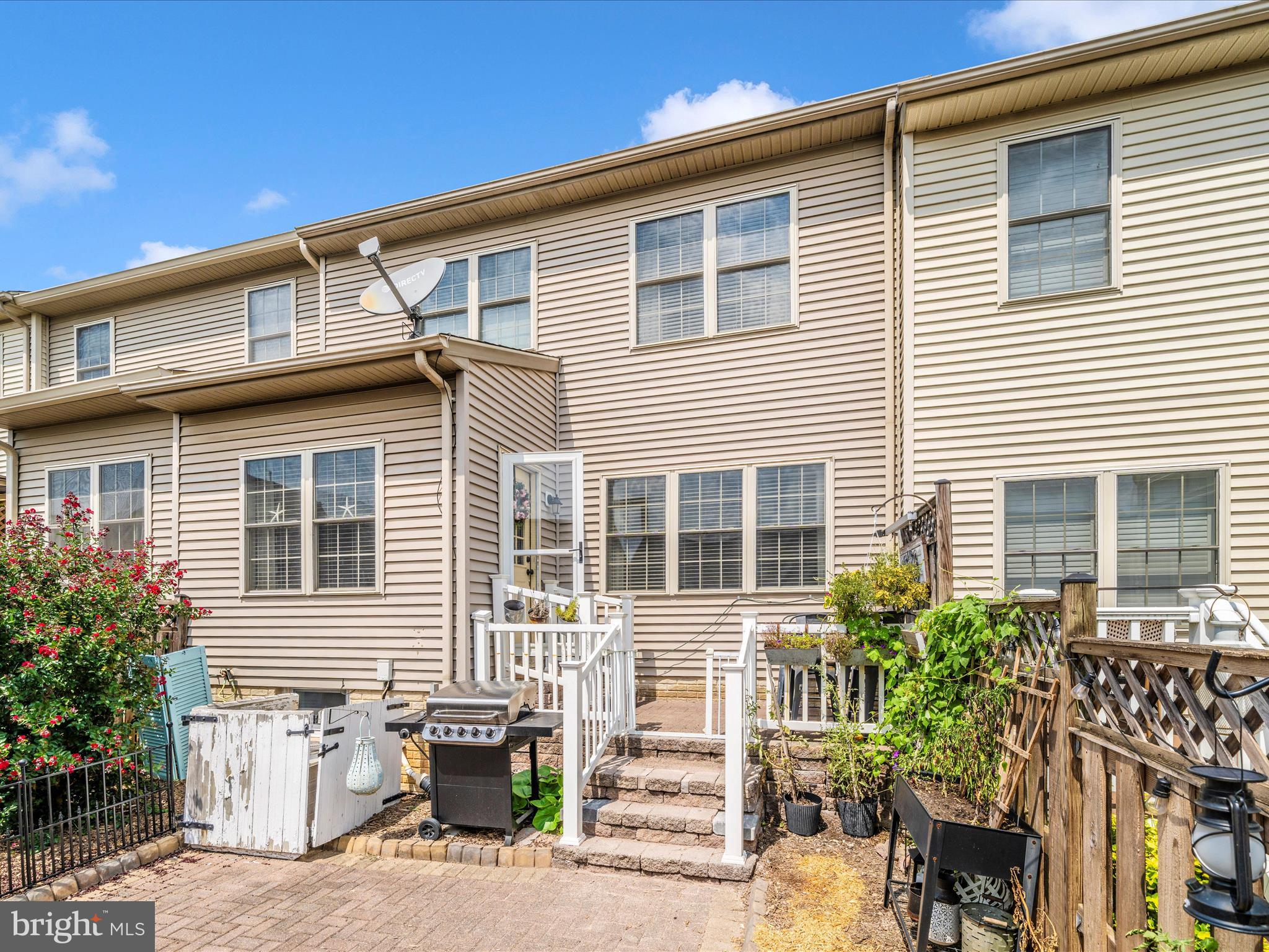 2529 Waterside Drive Frederick, MD 21701 - Photo 43 of 68 a front view of a house with outdoor seating
