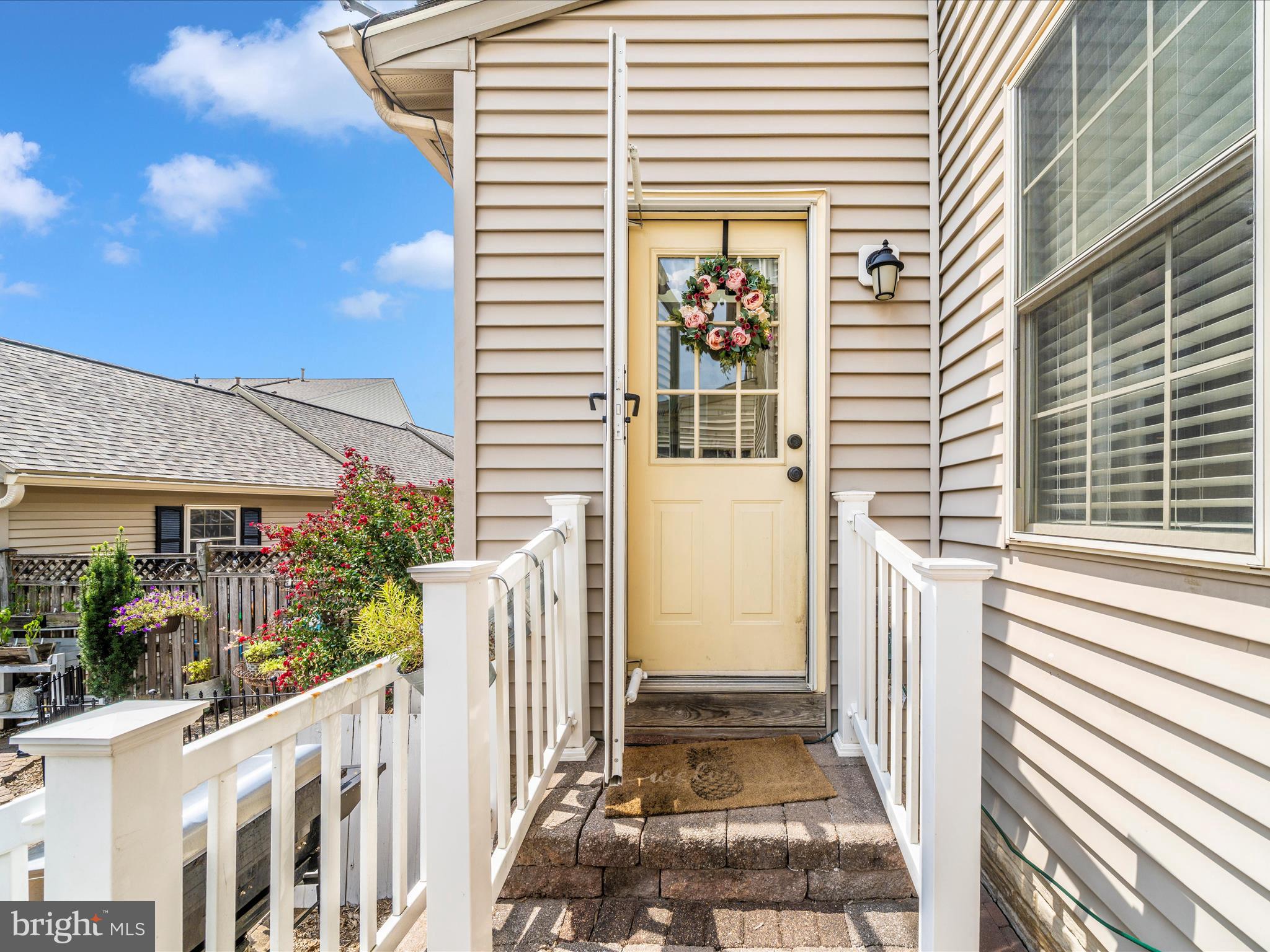 2529 Waterside Drive Frederick, MD 21701 - Photo 48 of 68 a view of a house with backyard and porch