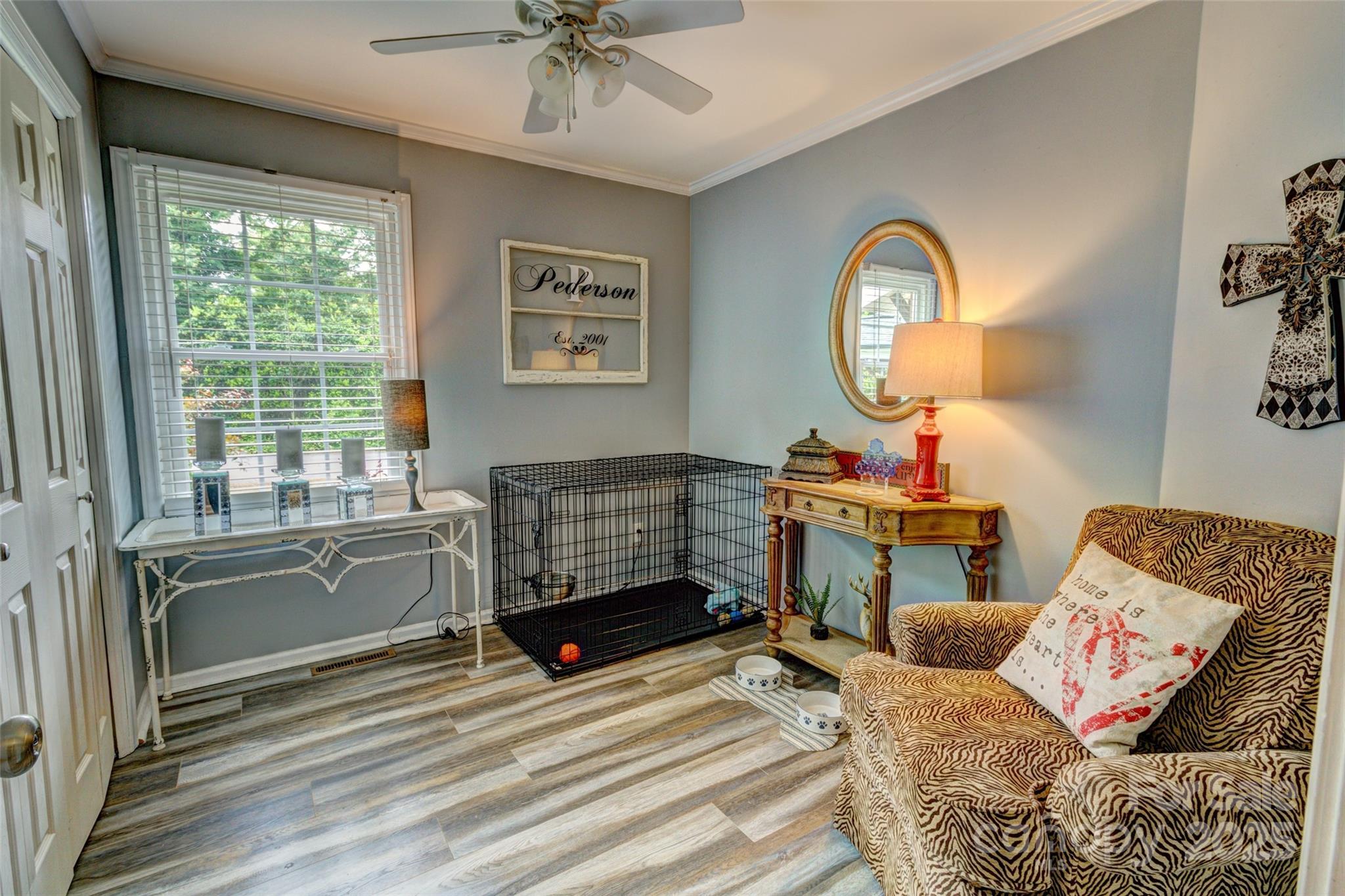 800 Sunset Road Cherryville, NC 28021 - Photo 13 of 20 a living room with furniture a window and a chandelier
